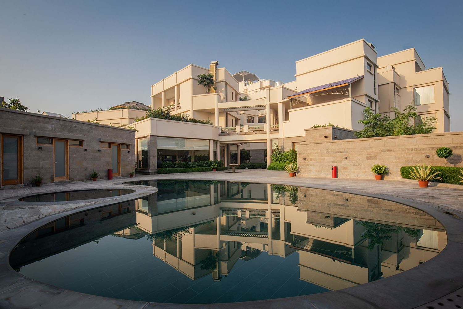 facade-shot-from-the-pool-naad-wellness